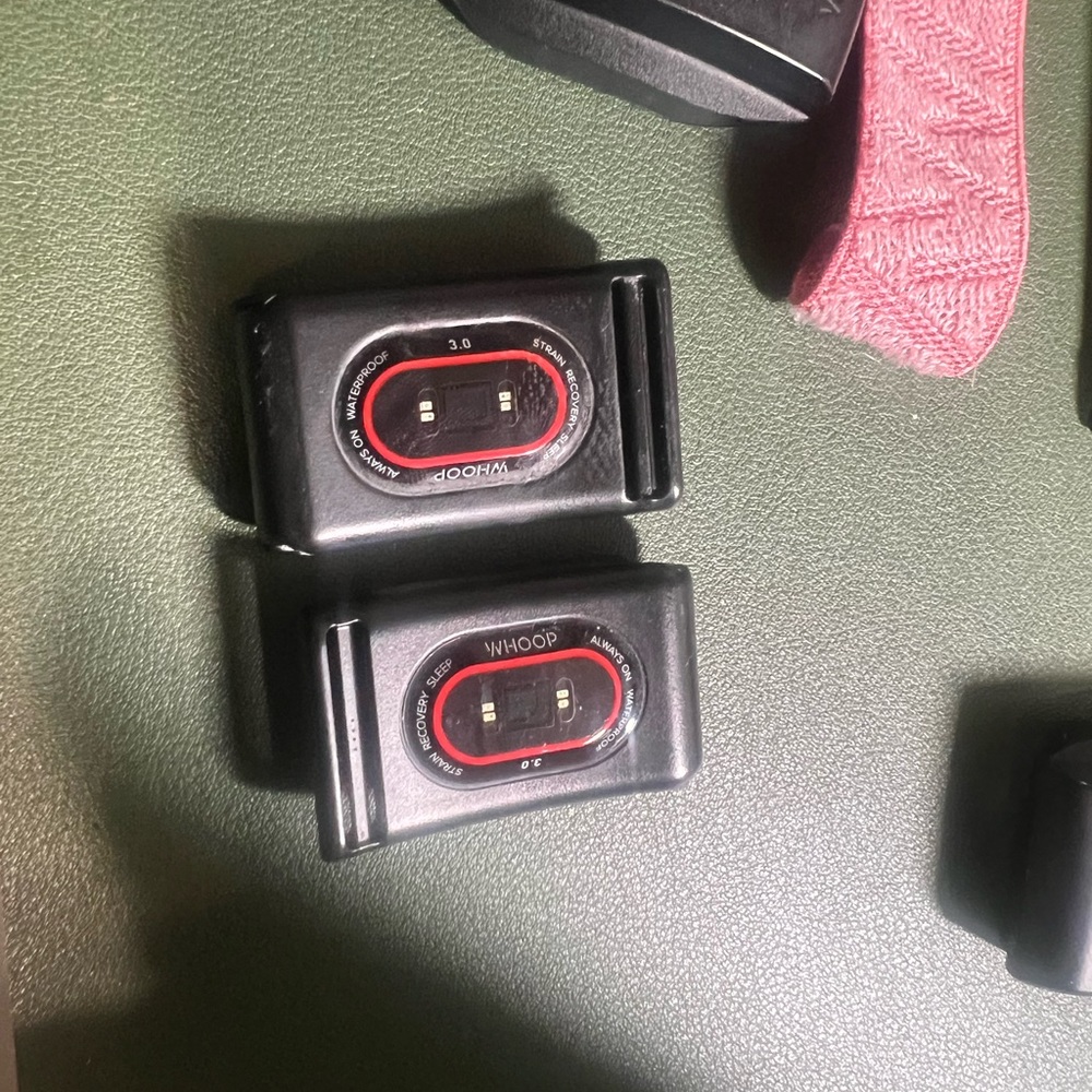 Whoop 3.0 with charger and various colored bands/clasps